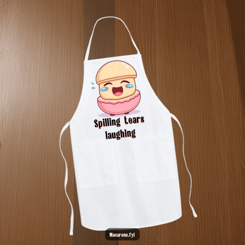 Funny macaron character laughing heartily with little joyful tears escaping, on a functional and funny chef’s apron.