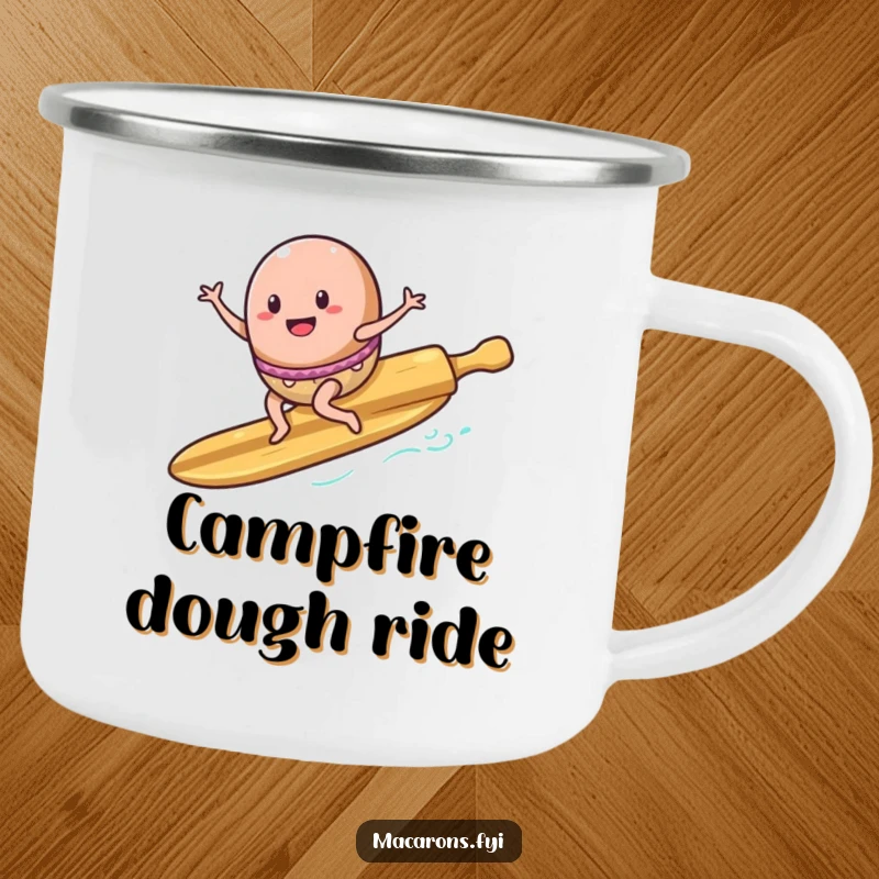 Funny Camping Mug: A sturdy mug shows a macaron character surfing a rolling pin surfboard, perfect for outdoor adventures.