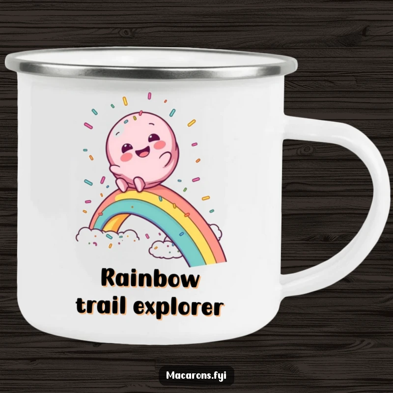 Funny macaron camping mug showing a macaron character gleefully sliding down a rainbow into a sprinkle cloud, for magical outdoor moments.