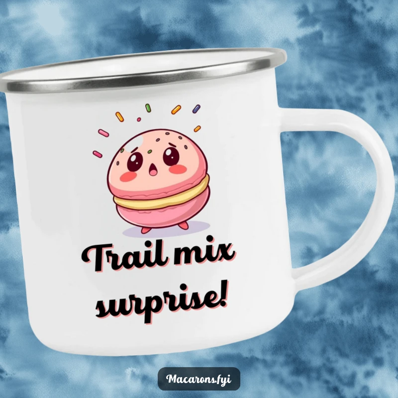 Funny macaron camping mug depicting a surprised macaron looking up at sprinkles, perfect for outdoor humor.