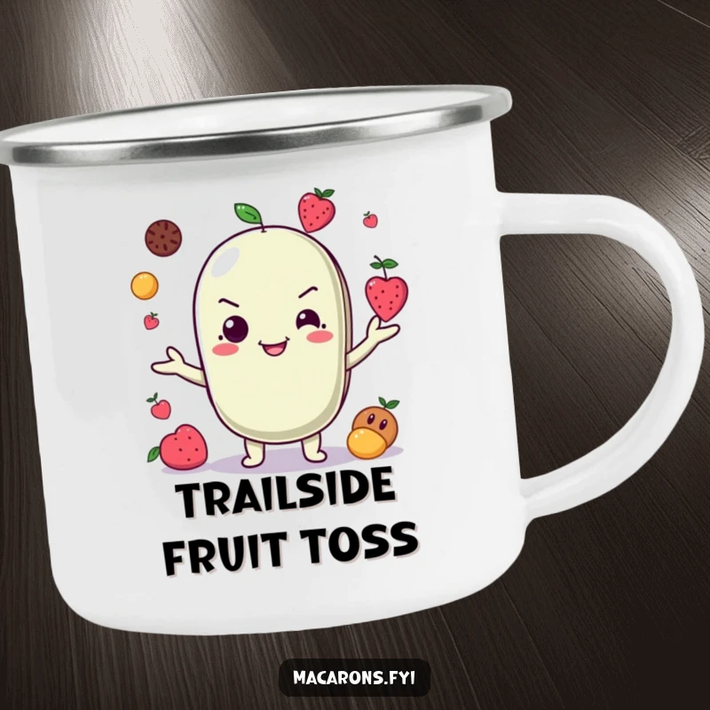 Funny Camping Mug: A sturdy mug shows a mischievous macaron character juggling fruits, perfect for outdoor fun and playfulness.