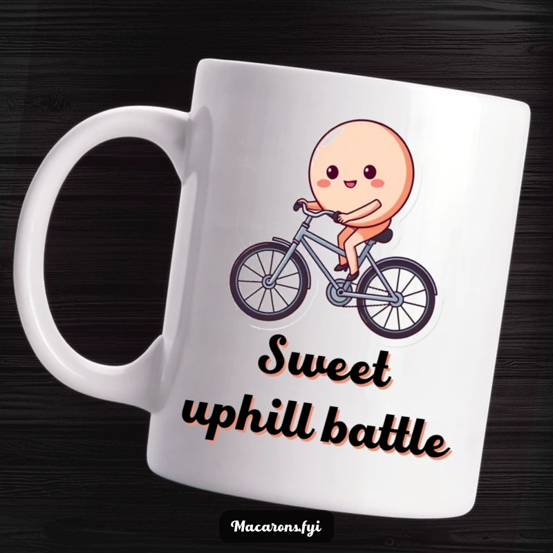 Funny macaron character on a tiny bicycle, pedaling with a determined and happy face, bringing joy to this ceramic mug.