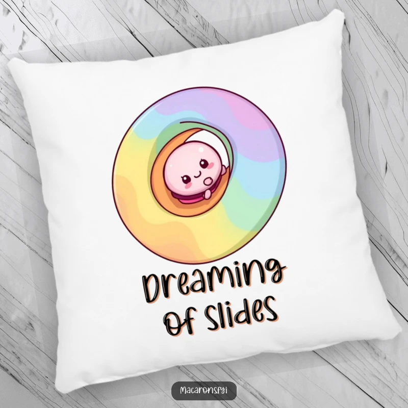 Soft funny macaron character mid-slide down a colorful rainbow swirl, featured on a plush pillow for cozy enjoyment.