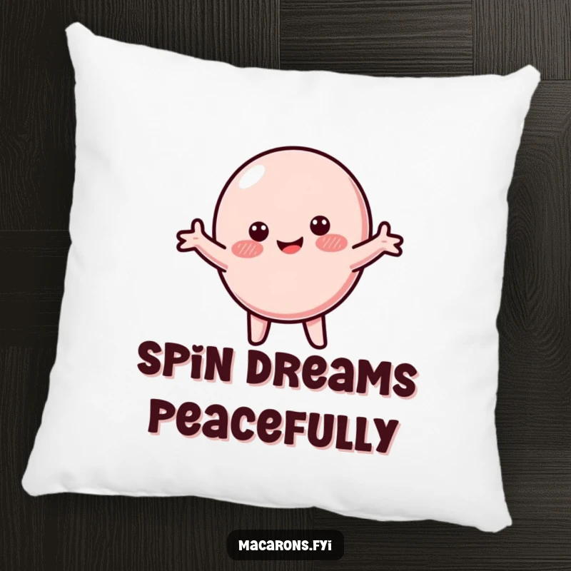 Funny macaron pillow featuring a blushing macaron character spinning happily with its arms spread wide, for cozy joy.