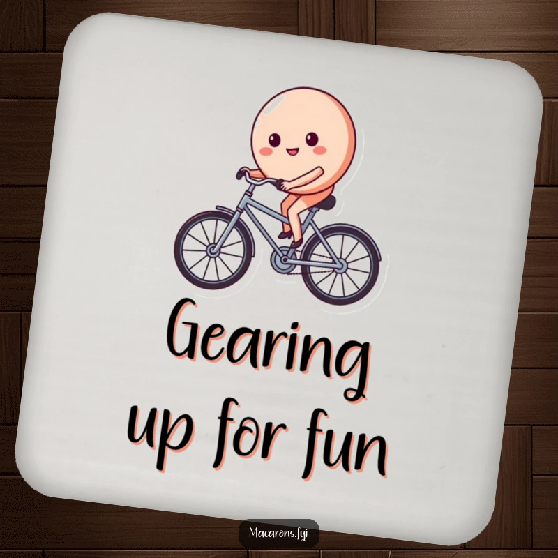 Funny macaron character on a tiny bicycle, pedaling with a determined and happy face, protecting your surfaces with this cute coaster.