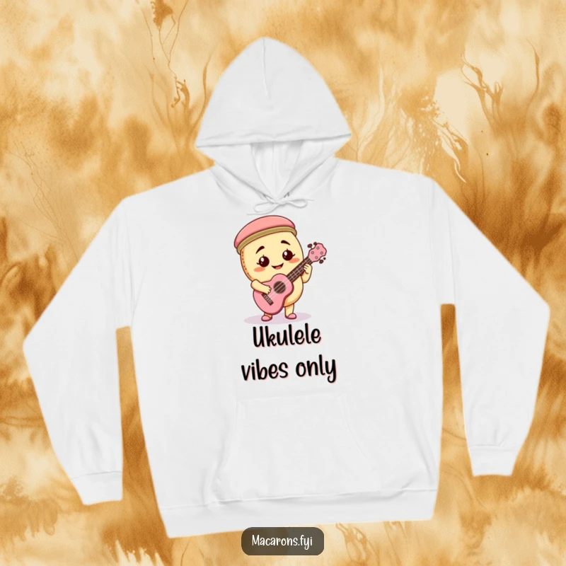 Funny macaron character playing a small ukulele with full enthusiasm and a goofy smile on a comfortable hoodie.