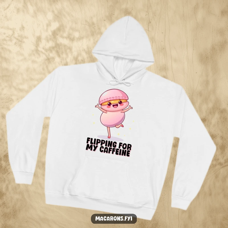 Funny Hoodie showcasing a dynamic macaron character executing a cartwheel amidst sparkling effects, perfect for cool weather fun.