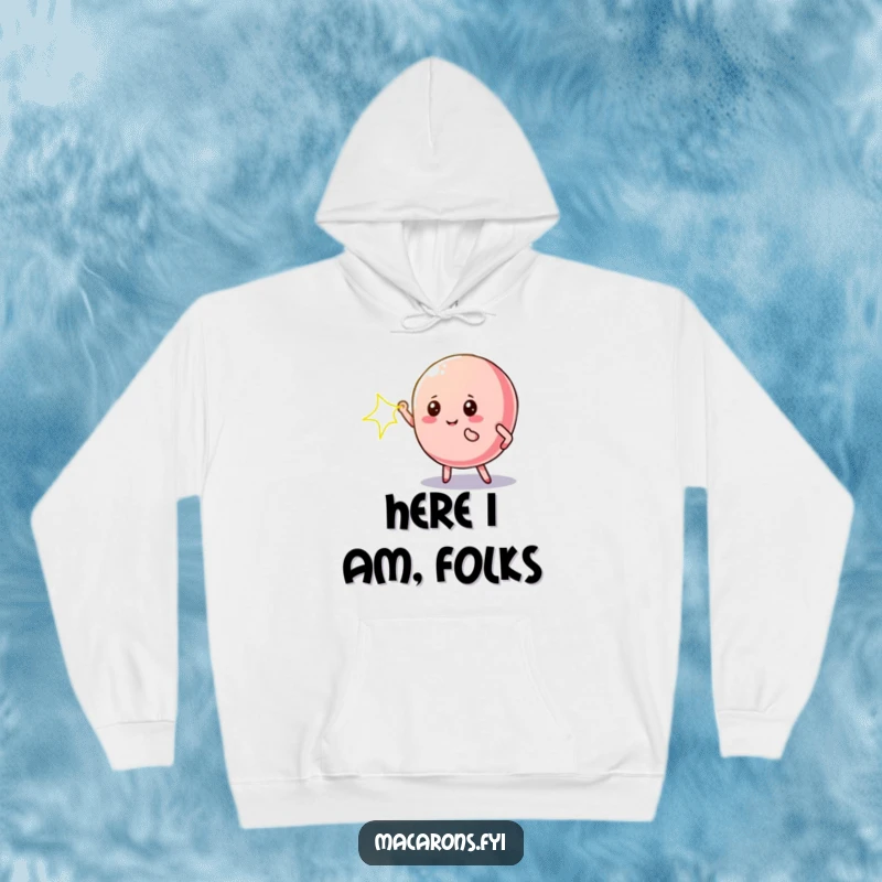 Funny macaron hoodie featuring a macaron character in a dramatic pose, illuminated by a spotlight, cozy and cool.