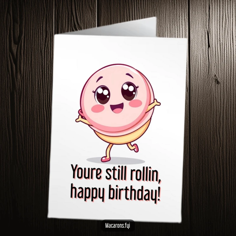 Funny Free Printable Birthday Card featuring a kawaii macaron character doing a joyful cartwheel with big, happy eyes.