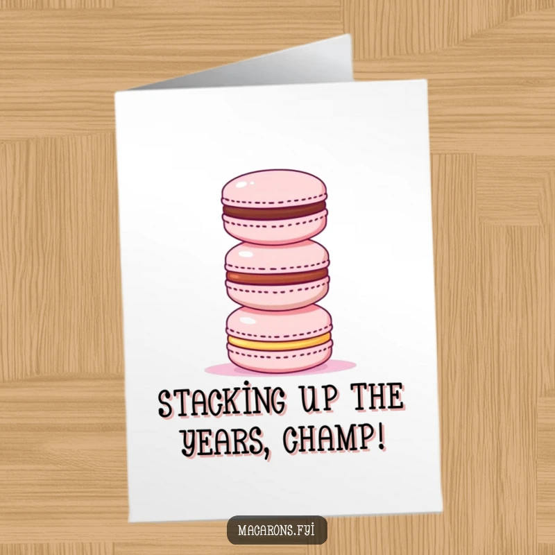 Funny Free Printable Birthday Card showing a triumphant macaron stacking smaller ones, a symbol of delicious success.