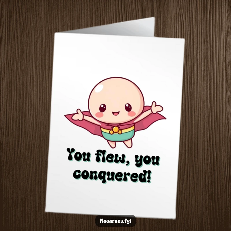 Funny Free Printable Congratulations Card of a macaron in a cape flying high to celebrate a big success.