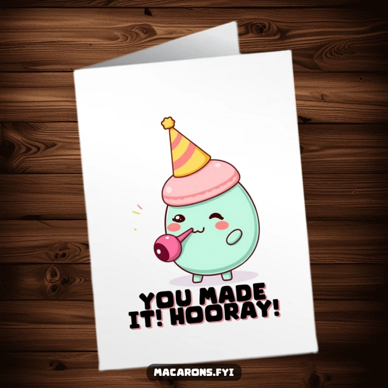 Funny Free Printable Congratulations Card: A macaron in a party hat comically blowing a tiny party blower, celebrating success.