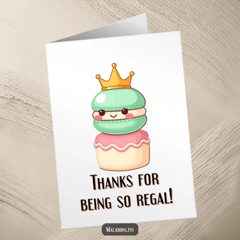 Funny Free Printable Thank You Card: A macaron wearing a small crown, looking regal atop a tiny cake, offering thanks.