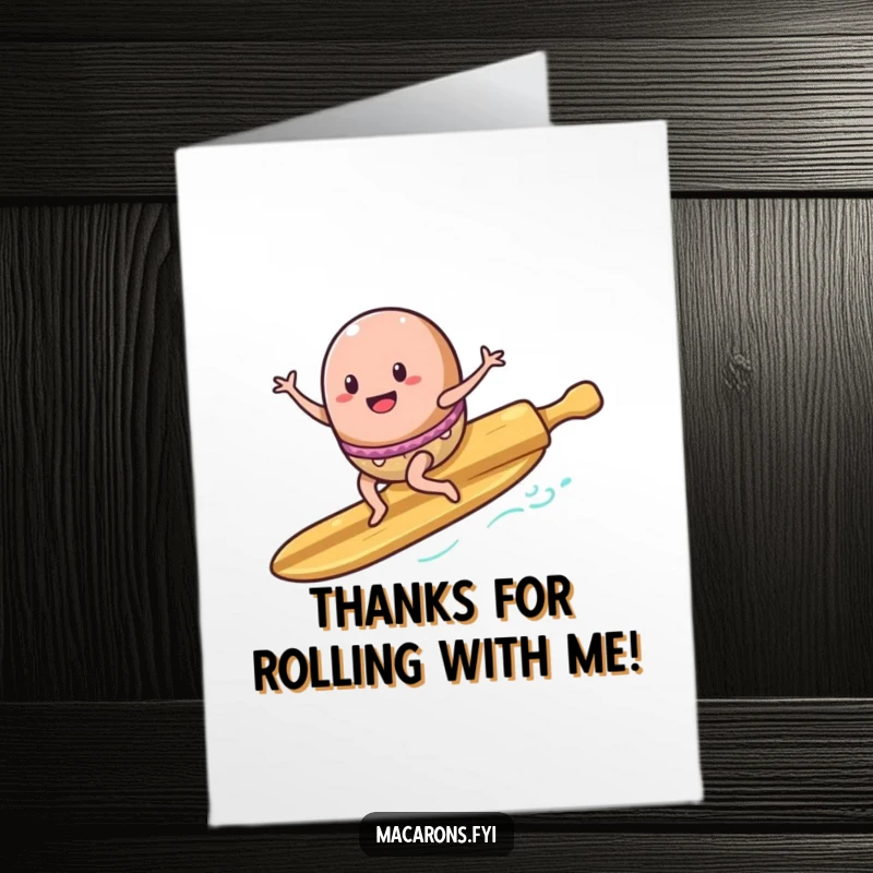 Funny Free Printable Thank You Card: A macaron character joyfully surfing down a rolling pin with a triumphant expression.