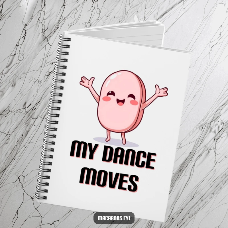 Funny macaron character doing a joyful, wobbly dance with arms outstretched, on the cover of a fun notebook.