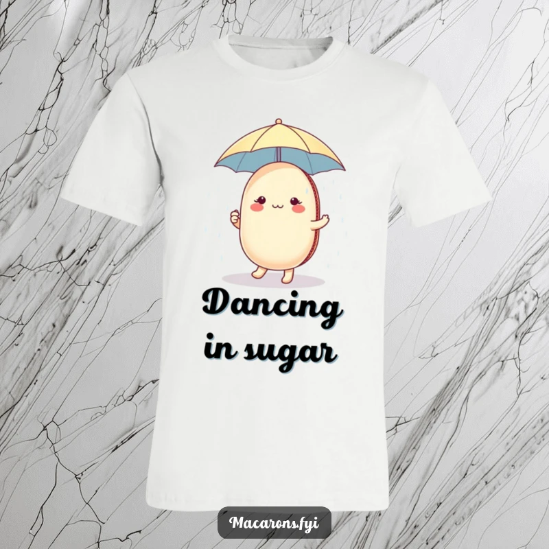 Funny macaron character holding a tiny umbrella, dancing gleefully in a sugar shower, featured on a whimsical t-shirt.