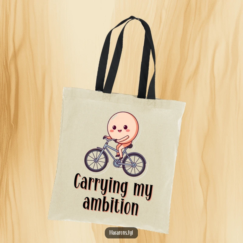 Funny macaron character on a tiny bicycle, pedaling with a determined and happy face, showcased on a spacious and stylish tote bag.