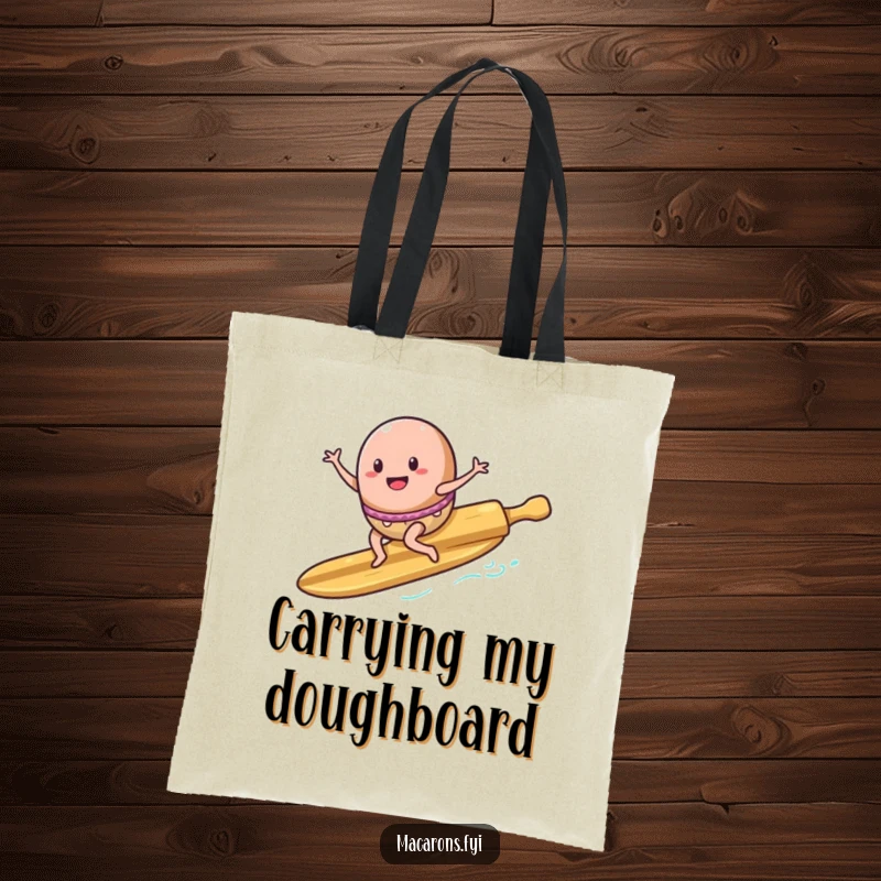 Funny Tote Bag: A macaron character rides a rolling pin surfboard with enthusiasm, ready to carry your items on an adventure.