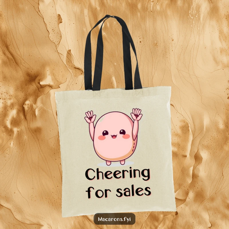 Funny macaron character joyfully cheering with tiny hands raised high, on a tote bag for cheerful errands.